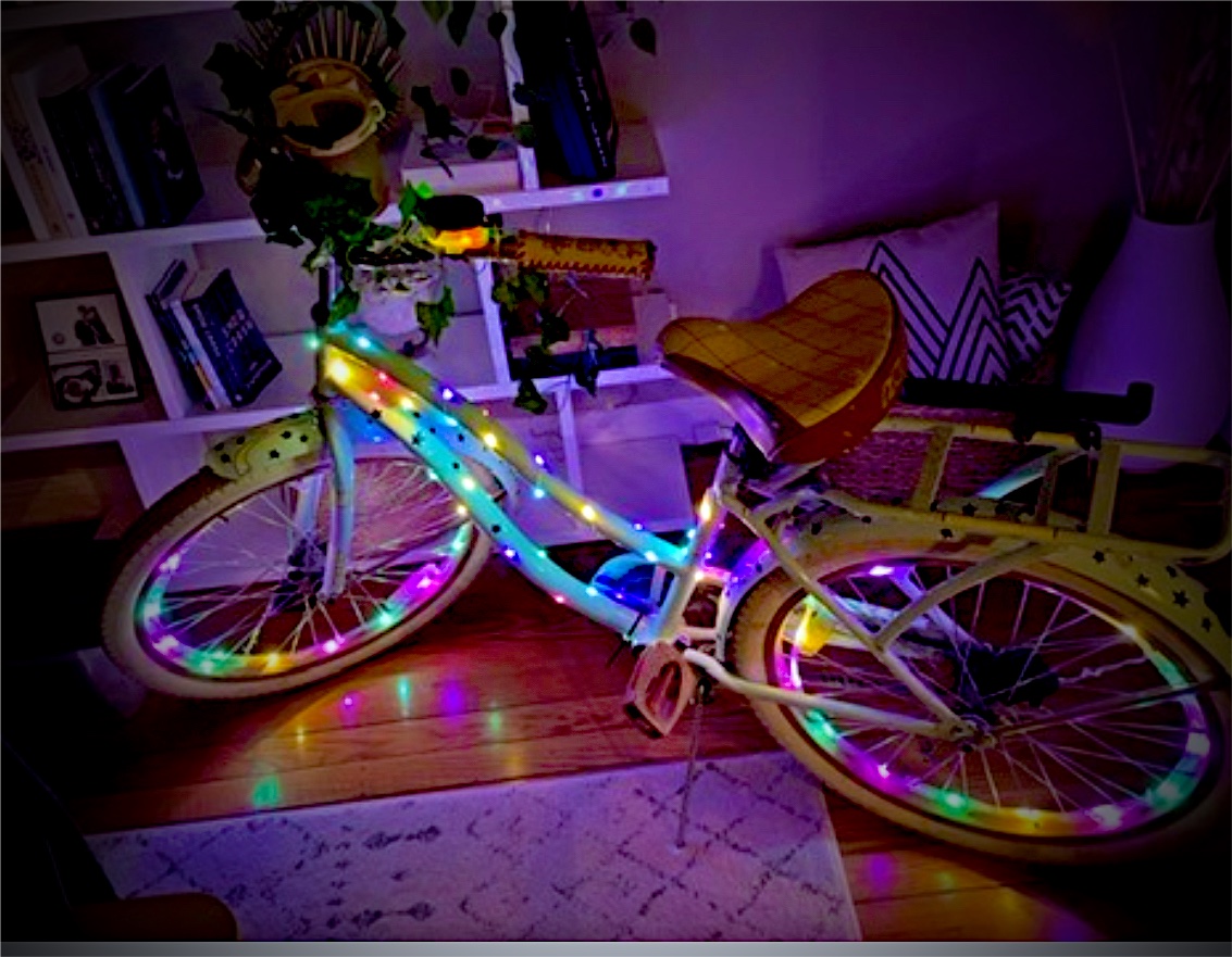 Customer's bicycle wrapped in glowing light