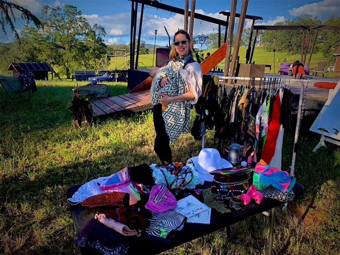 My stall of finished hats, laid out in the sun