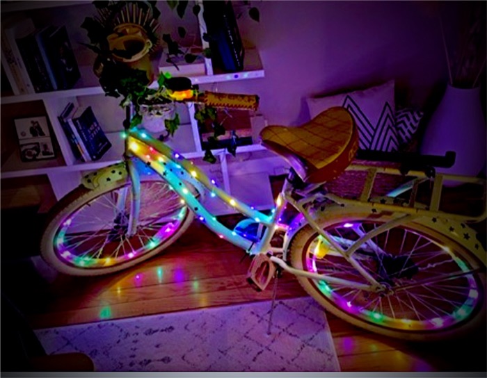 Bicycle wrapped in glowing light